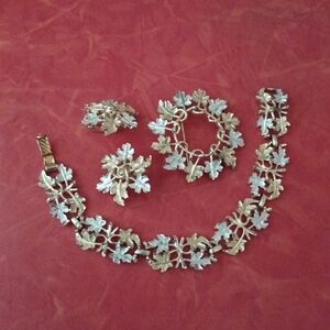 Sarah Coventry broach clip earrings and matching bracelet